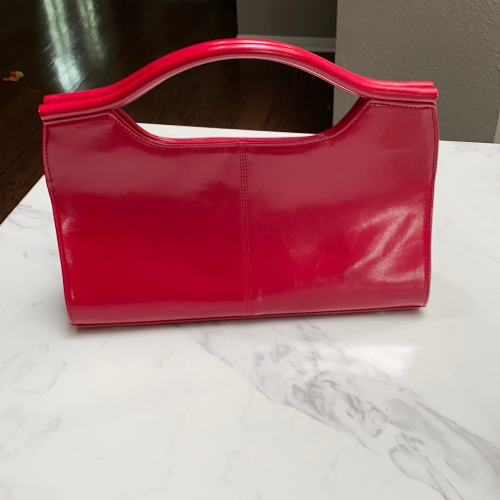 Red leather handbag